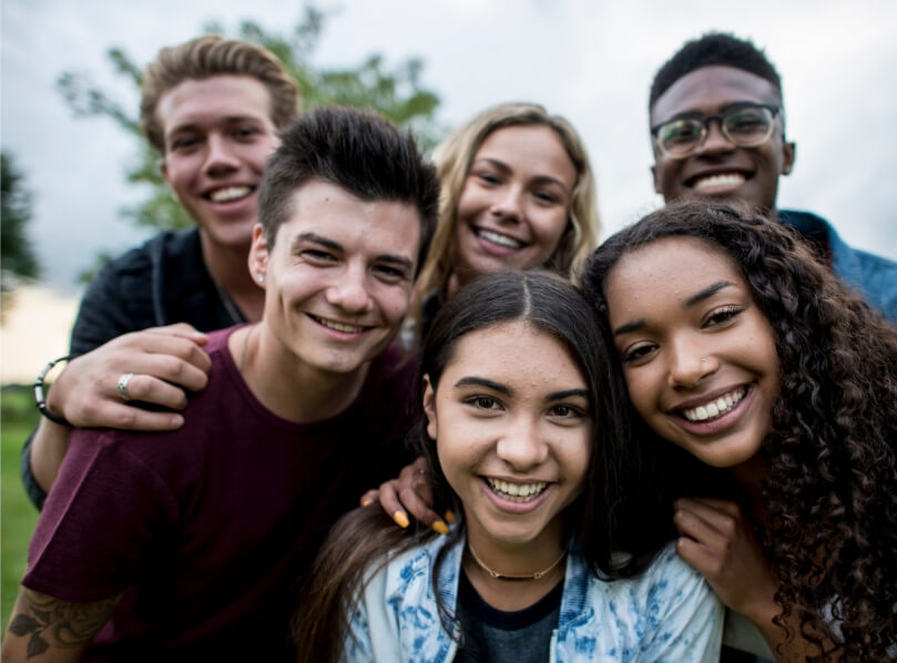 Healthy group of teens at a park