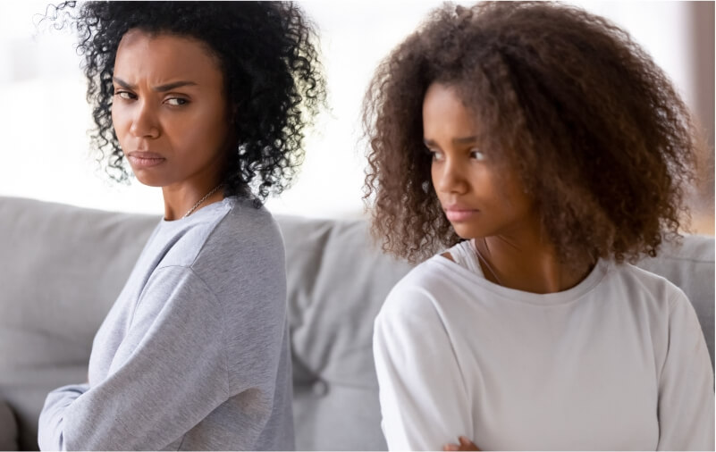 Mother and daughter expressing anger